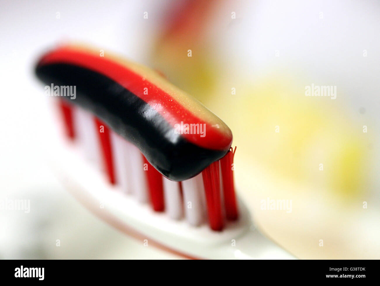 Berlin, Germany. 09th June, 2016. ILLUSTRATION Blackredgold toothpaste is applied on a