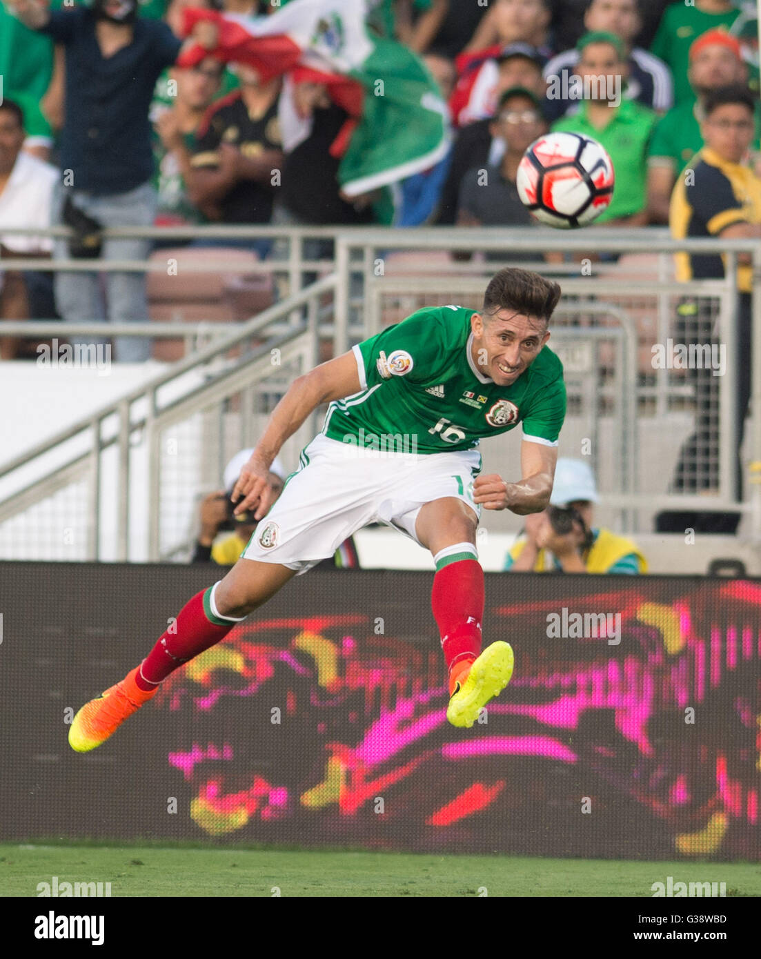 Pasadena, USA. 9th June, 2016. Mexico's Hector Herrera vies for the ball during the Copa America Centenario tournament Group C football match between Mexico and Jamaica in Pasadena, California, the United States, on June 9, 2016. Credit:  Yang Lei/Xinhua/Alamy Live News Stock Photo