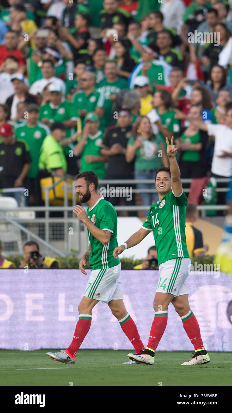 Pasadena, USA. 9th June, 2016. Mexico's Javier 'Chicharito' Hernandez (R) celebrates after scoring during the Copa America Centenario tournament Group C football match between Mexico and Jamaica in Pasadena, California, the United States, on June 9, 2016. Credit:  Yang Lei/Xinhua/Alamy Live News Stock Photo