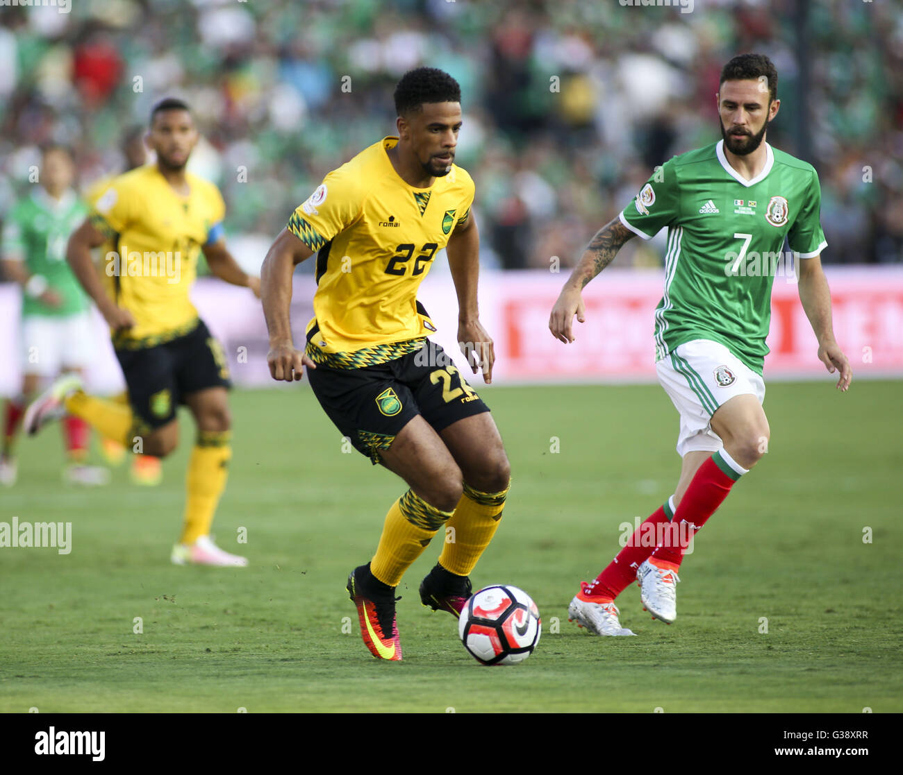 Los Angeles, California, USA. 9th June, 2016. Jamaica midfielder Garath McCleary #22 and Mexico defender Miguel Layun #7 in a Copa America soccer match between Mexico and ÃŠJamaica of Group C at the Rose Bowl in Pasadena, California, June 9, 2016. Mexico won 2-0. Credit:  Ringo Chiu/ZUMA Wire/Alamy Live News Stock Photo