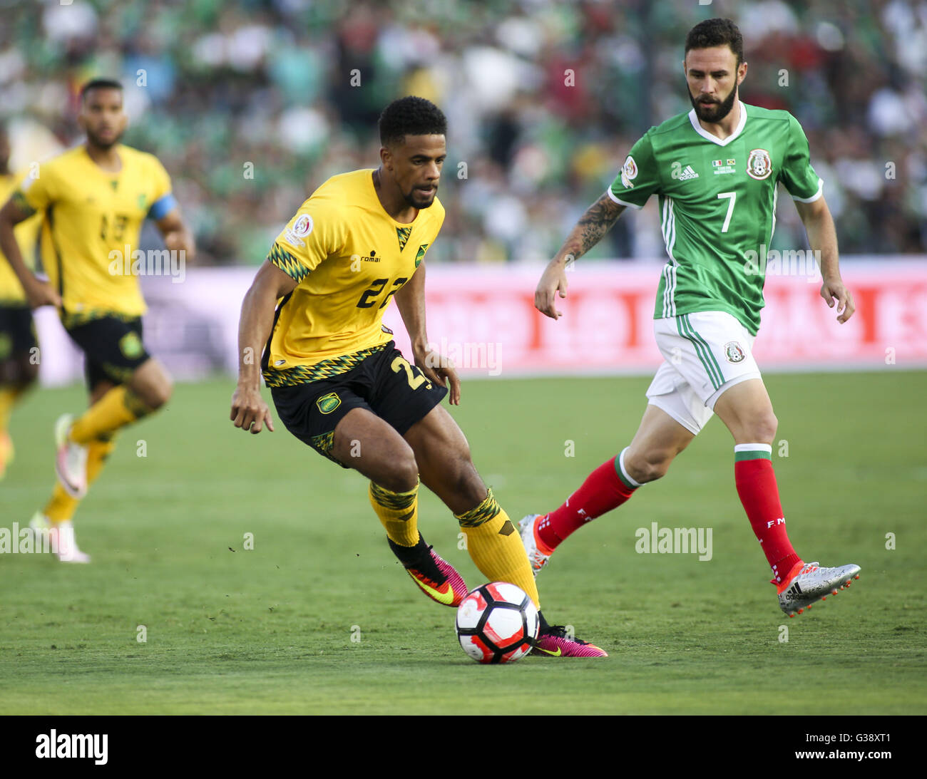 Los Angeles, California, USA. 9th June, 2016. Jamaica midfielder Garath McCleary #22 and Mexico defender Miguel Layun #7 in a Copa America soccer match between Mexico and ÃŠJamaica of Group C at the Rose Bowl in Pasadena, California, June 9, 2016. Mexico won 2-0. Credit:  Ringo Chiu/ZUMA Wire/Alamy Live News Stock Photo