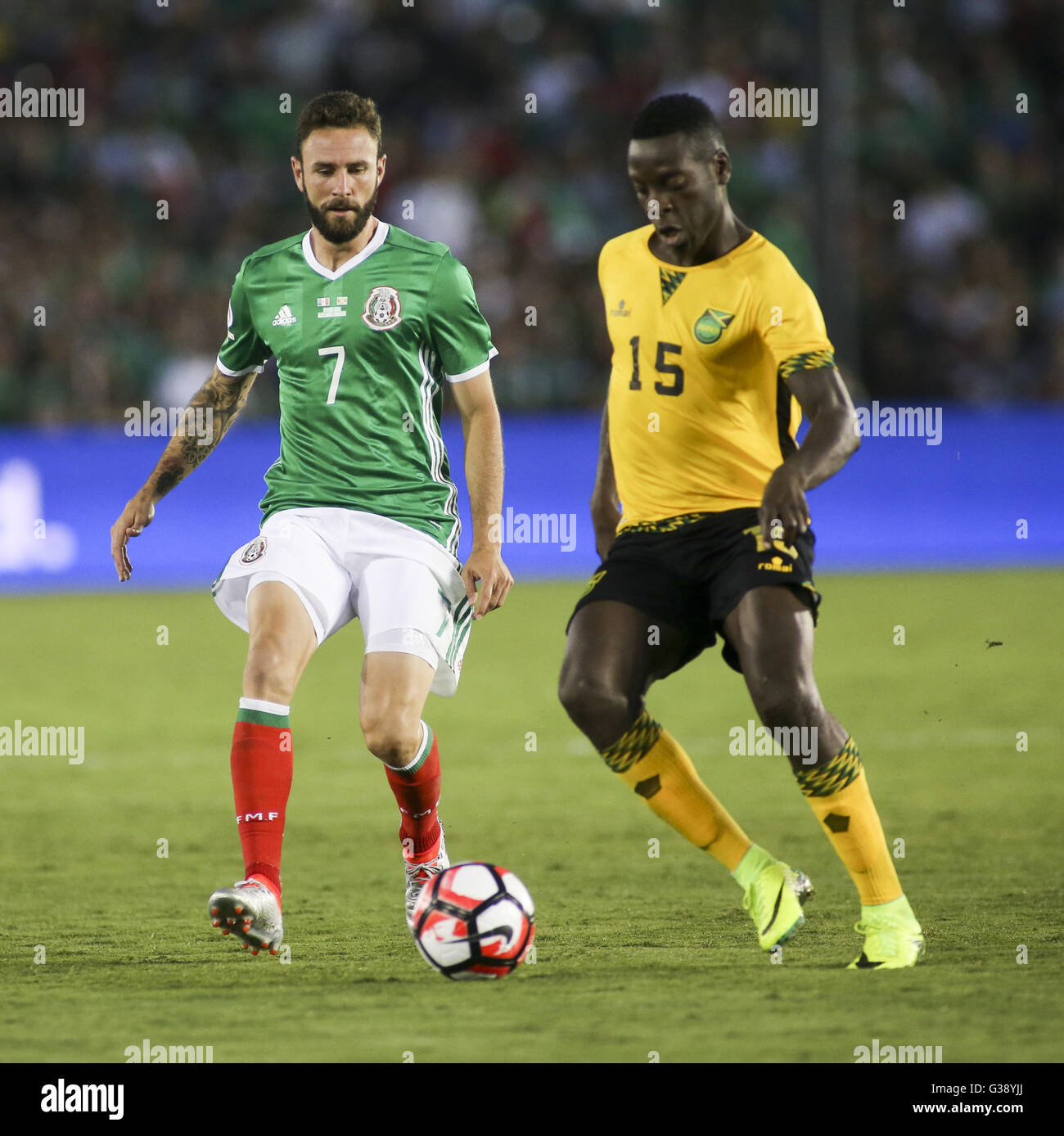 Los Angeles, California, USA. 9th June, 2016. Mexico defender Miguel Layun #7 and Jamaica midfielder Je-Vanghn Watson #15 in a Copa America soccer match between Mexico and ÃŠJamaica of Group C at the Rose Bowl in Pasadena, California, June 9, 2016. Mexico won 2-0. Credit:  Ringo Chiu/ZUMA Wire/Alamy Live News Stock Photo