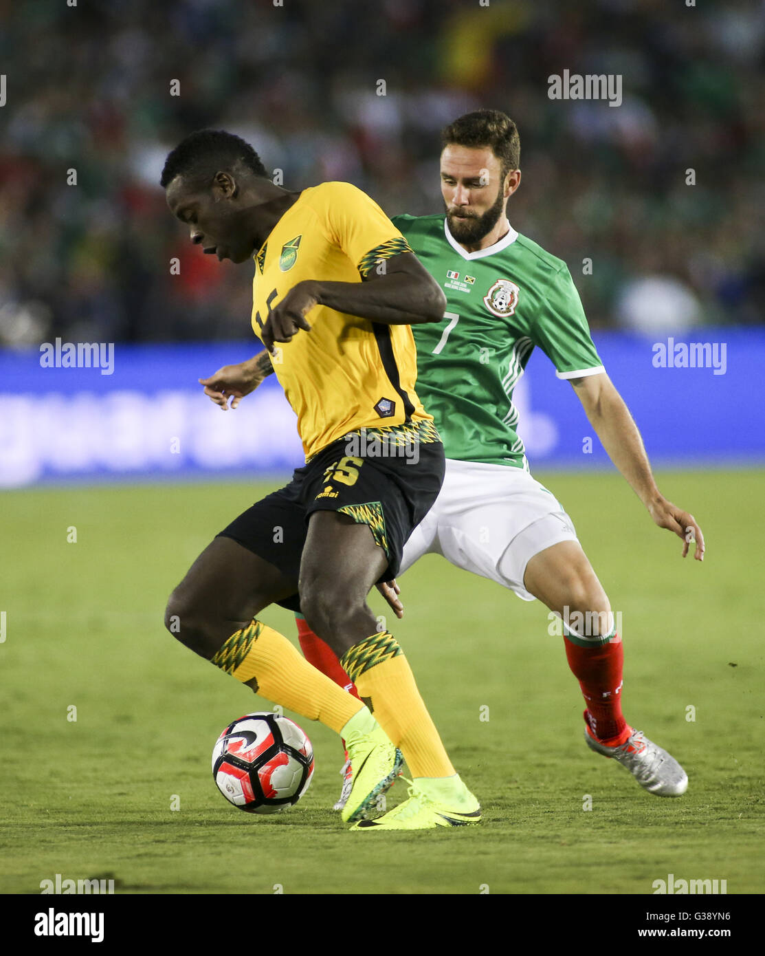 Los Angeles, California, USA. 9th June, 2016. Mexico defender Miguel Layun #7 and Jamaica midfielder Je-Vanghn Watson #15 in a Copa America soccer match between Mexico and ÃŠJamaica of Group C at the Rose Bowl in Pasadena, California, June 9, 2016. Mexico won 2-0. Credit:  Ringo Chiu/ZUMA Wire/Alamy Live News Stock Photo