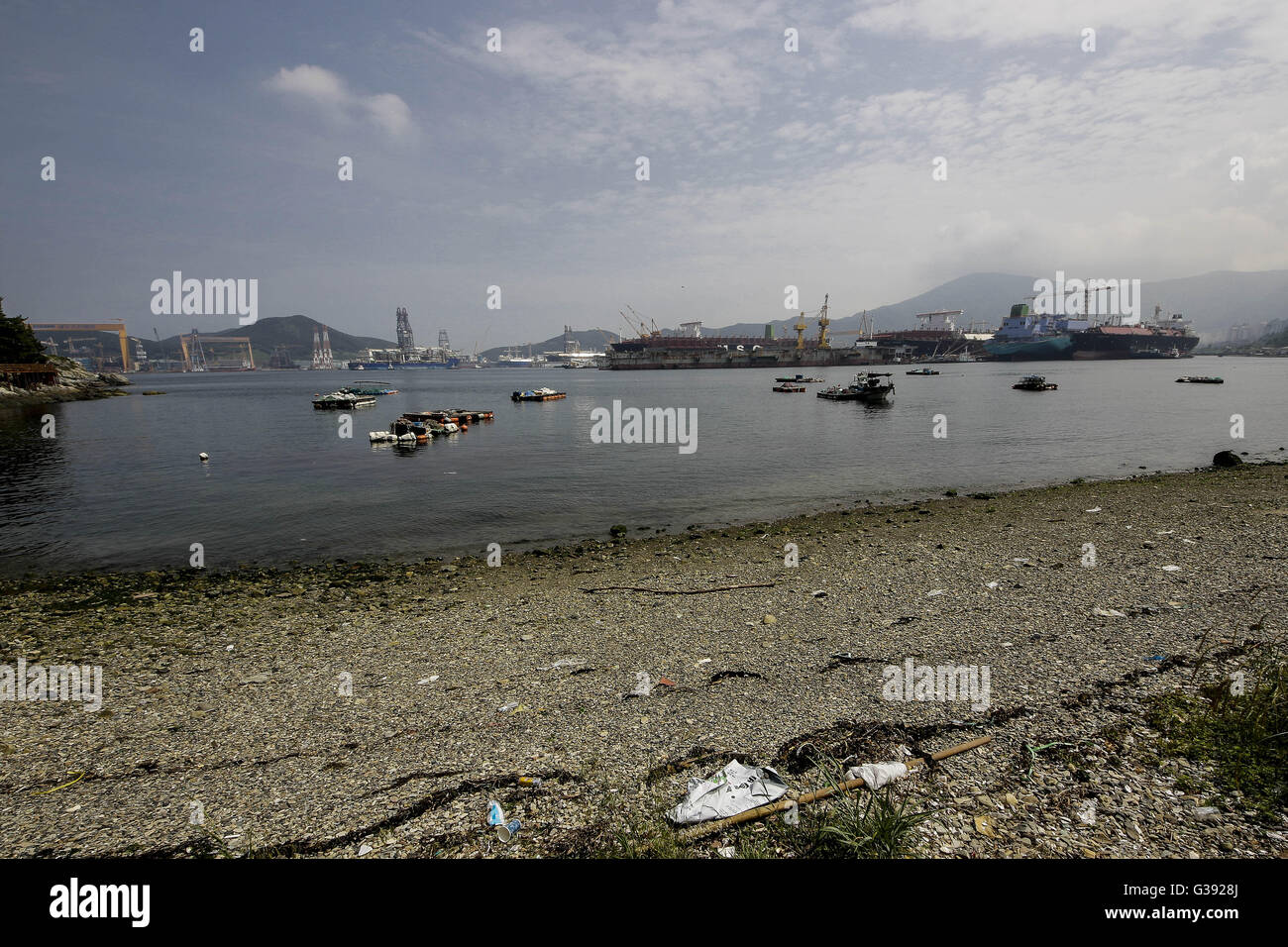 Geoje, Gyeongnam, South Korea. 7th June, 2016. View of DSME Shipbuilding yard in Geoje, South Korea. Shipbuilding has been central to South Korea's economy since the 1970s. Ships accounted for 8.5 percent of the country's total exports through June 20 of October 2015, according to the trade ministry. After more than a decade of global dominance, South Korea's shipbuilders face an unprecedented crisis that threatens the very survival of one of the flagship industries of Asia's fourth largest economy. Major South Korean shipbuilders plan to restructure their operations in earnest amid uncertain Stock Photo