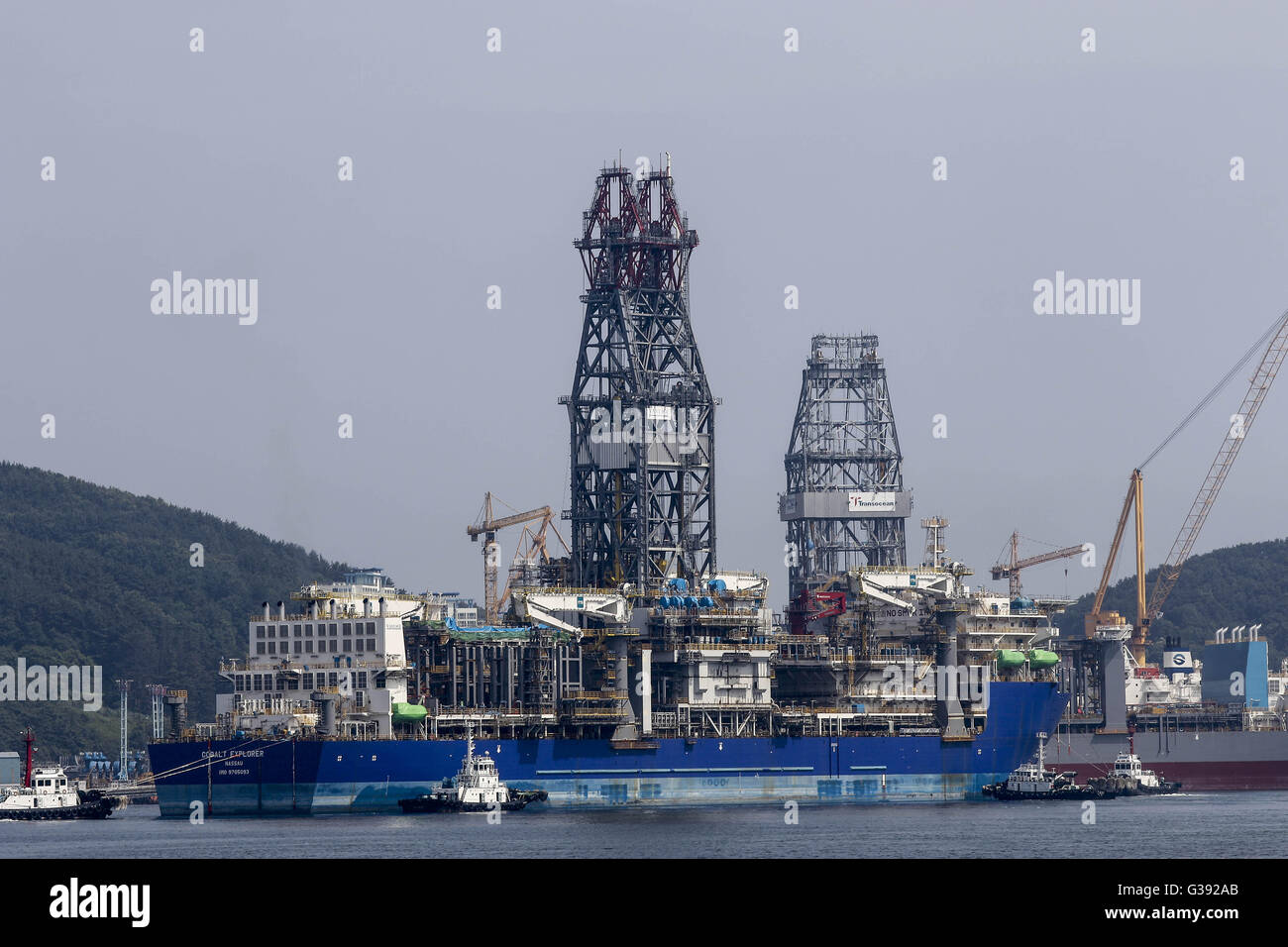 June 7, 2016 - Geoje, Gyeongnam, South Korea - Ships under construction sit moored at the DSME shipyard in Geoje, South Korea. Shipbuilding has been central to South Korea's economy since the 1970s. Ships accounted for 8.5 percent of the country's total exports through June 20 of October 2015, according to the trade ministry. After more than a decade of global dominance, South Korea's shipbuilders face an unprecedented crisis that threatens the very survival of one of the flagship industries of Asia's fourth largest economy. Major South Korean shipbuilders plan to restructure their operations  Stock Photo