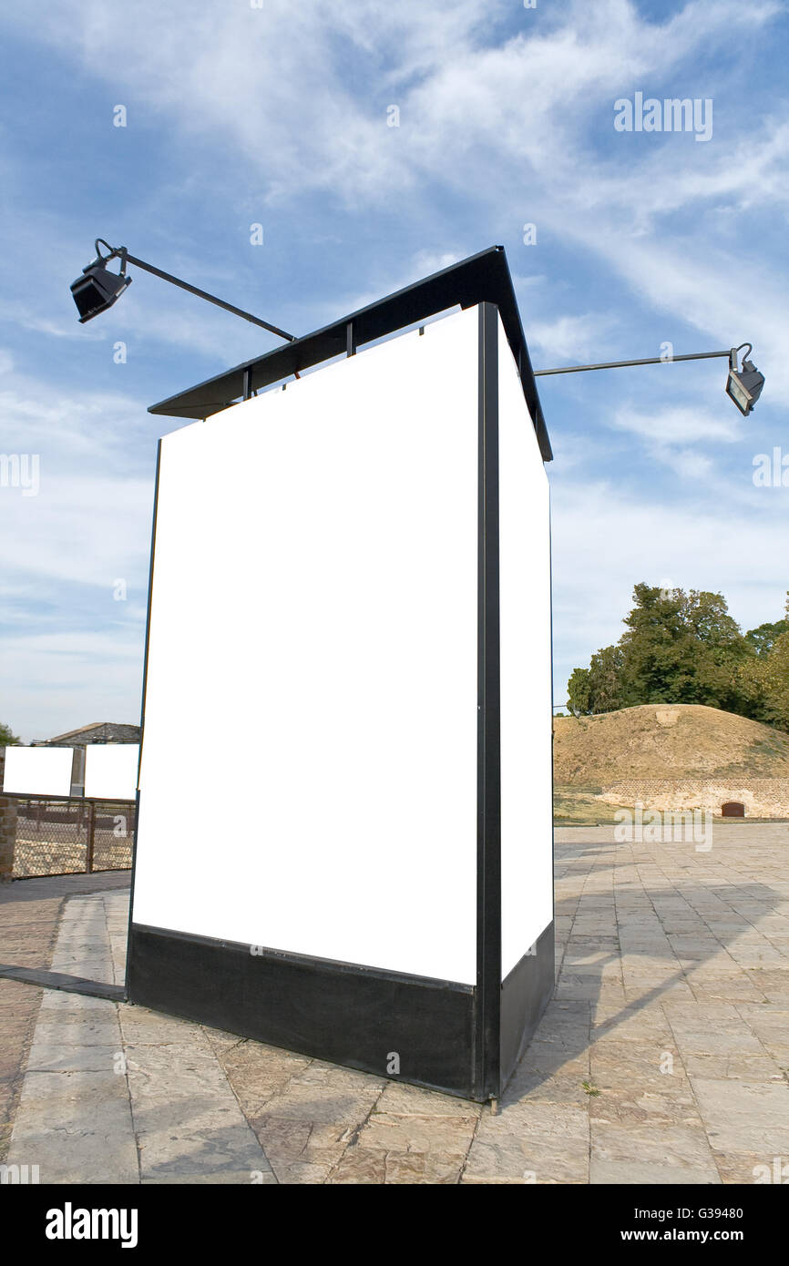 Blank billboard in a park with blue sky Stock Photo - Alamy
