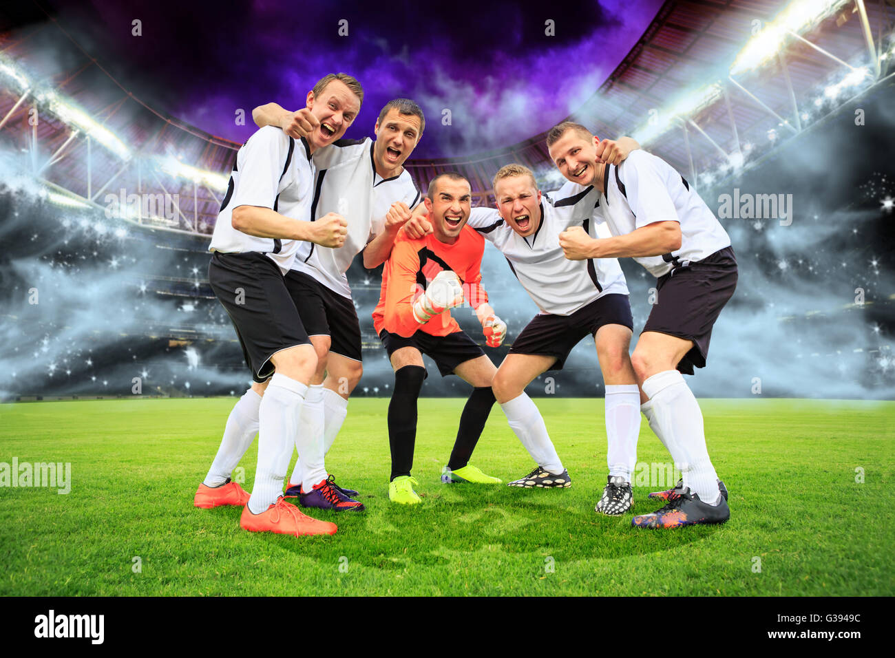 scenes from a soccer or football game with cheering male player Stock Photo