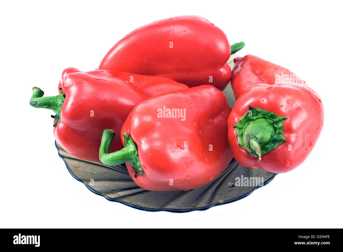 Red pepper in glass bowl isolated on white background Stock Photo