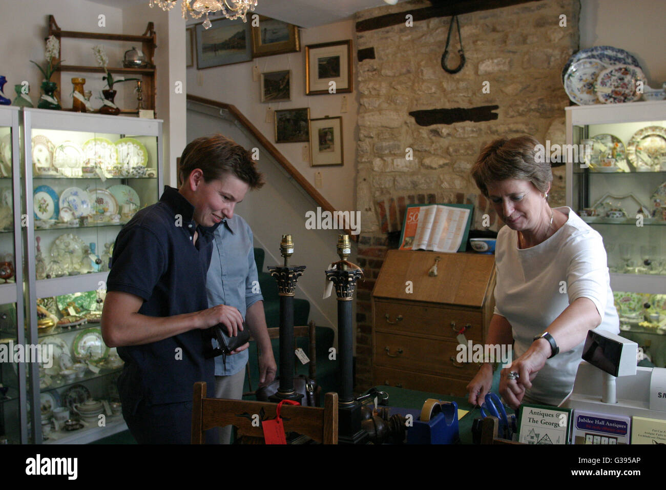 Cotswolds. Transaction at Antiques at the on Burford's High