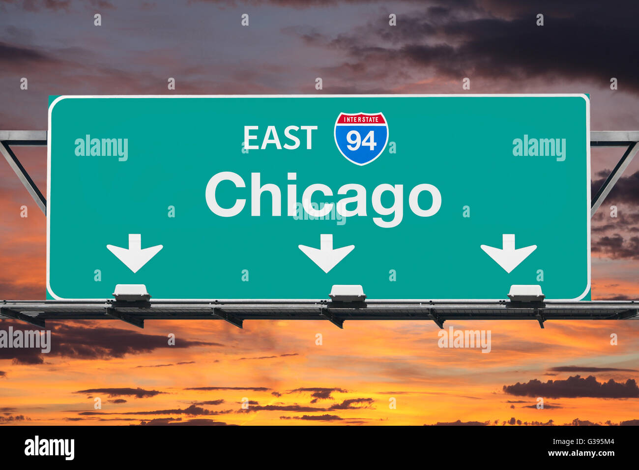Chicago Interstate 94 east highway sign with sunrise sky. Stock Photo