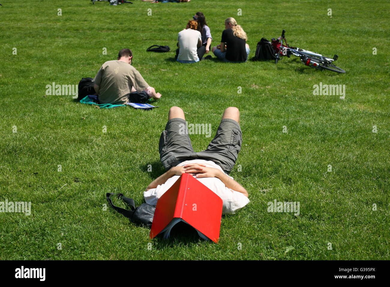 Summertime, University Bonn Campus, sleeping student, Bonn, Germany Stock Photo