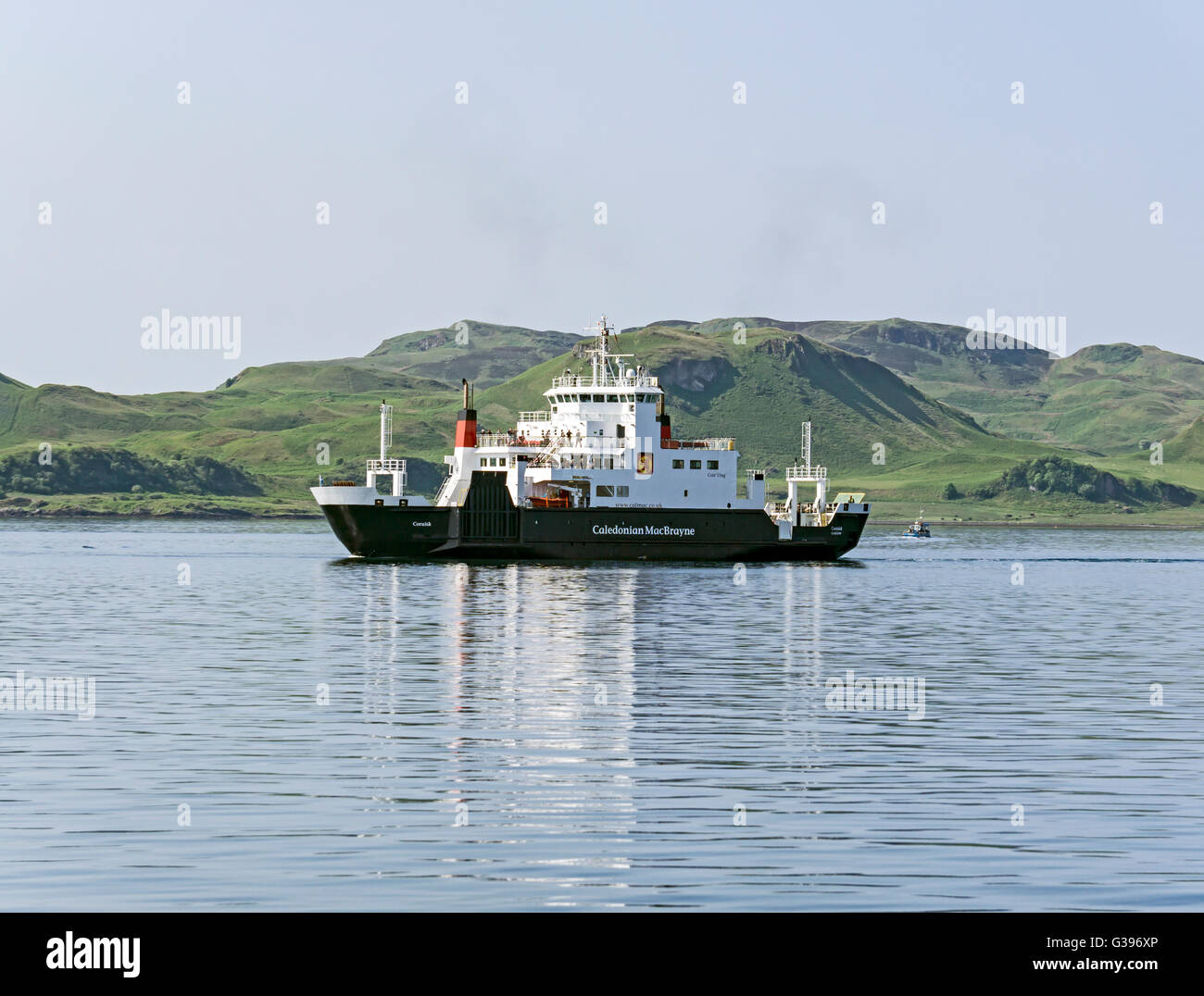 Caledonian Macbrayne car and passenger ferry Coruisk in Oban bay  Argyll & Bute Scotland with island Kerrera rear Stock Photo