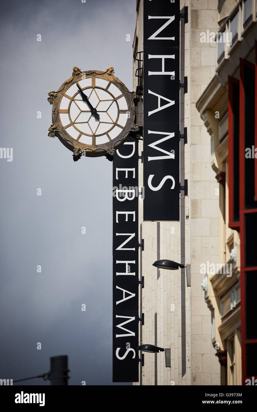 Debenhams in Rylands Building a Grade II 2 listed building Market Street Manchester, close up of signs and clock on the exterior Stock Photo
