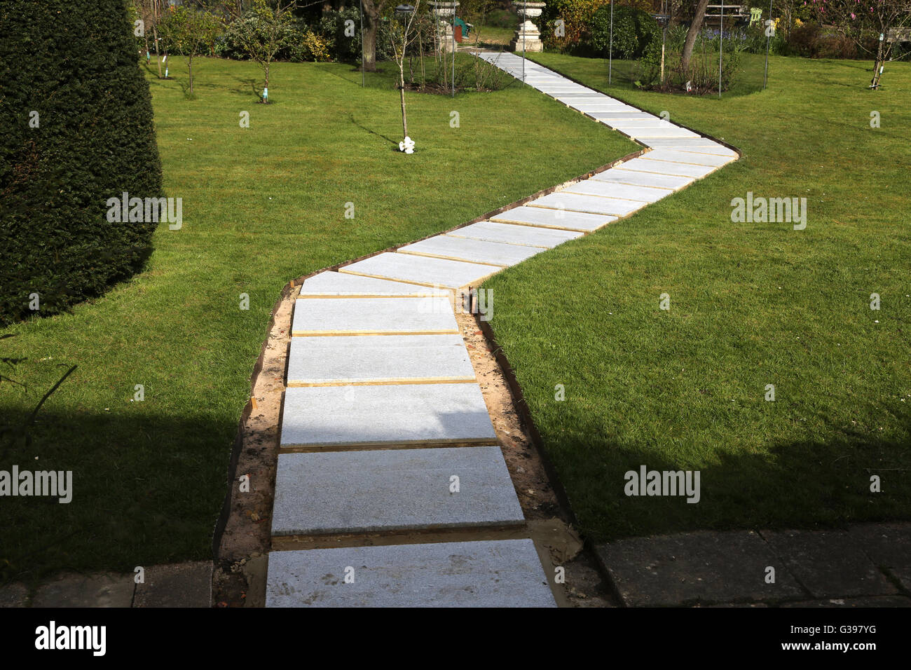 Laying New Garden Path New Concrete Slabs Surrey England Stock Photo