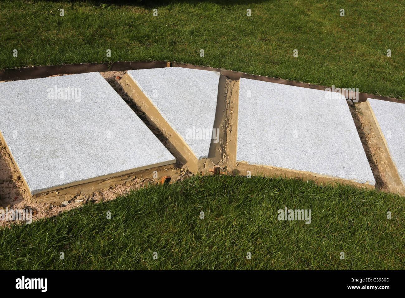 Laying New Garden Path New Concrete Slabs Surrey England Stock Photo