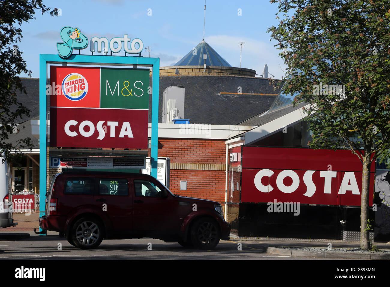 Car Parked Outside Moto Service Station On M4 England Stock Photo