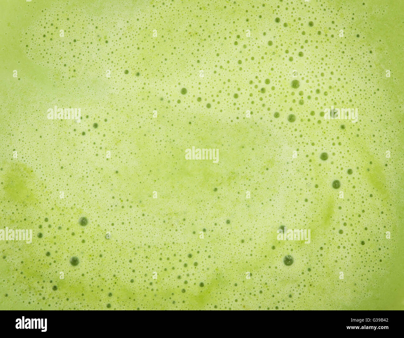 Background of close focus on melted green tea ice cream which having