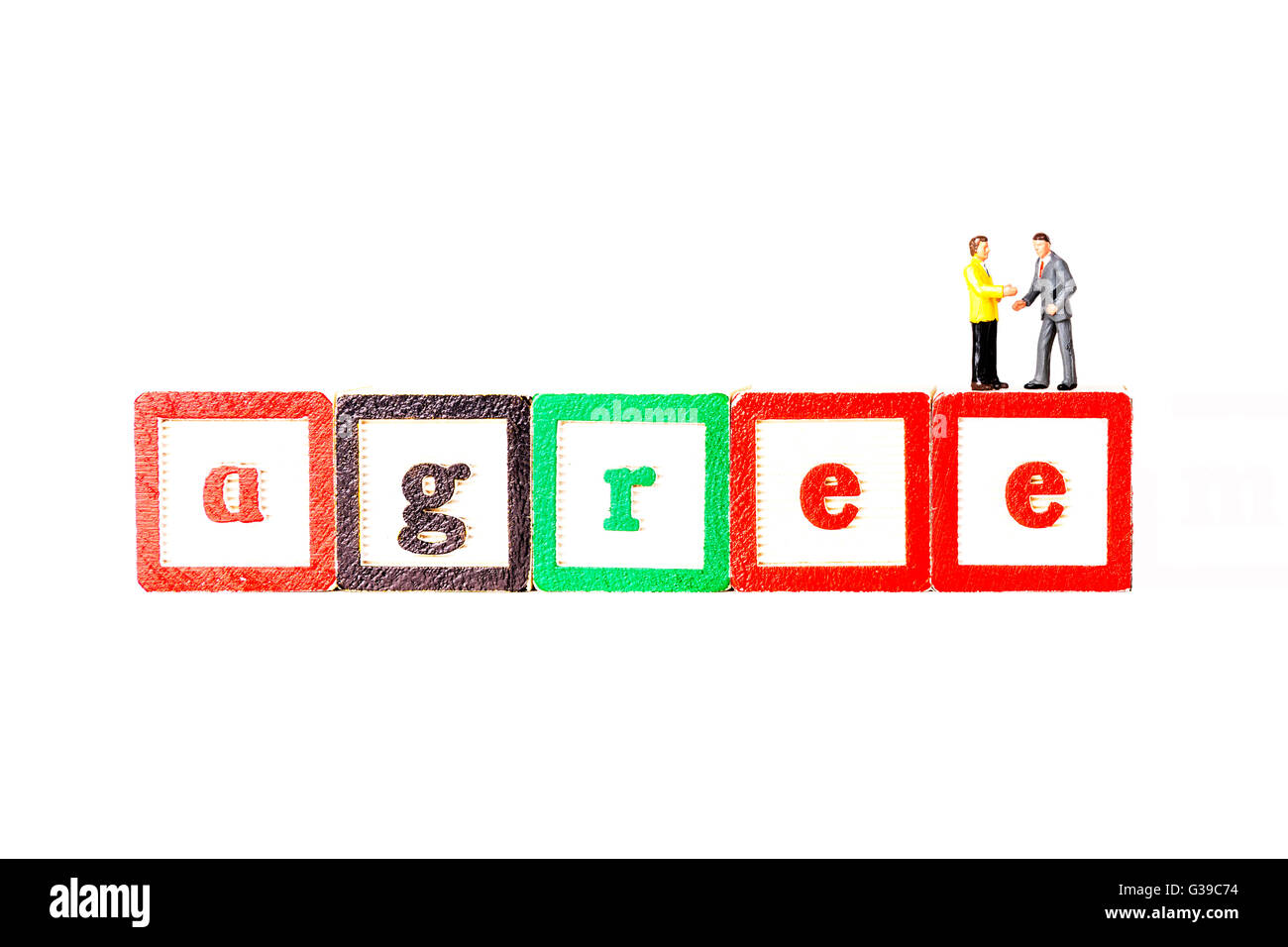 Agree agreement deal business businessmen men agreeing shaking hands handshake Cutout cut out white background isolated Stock Photo