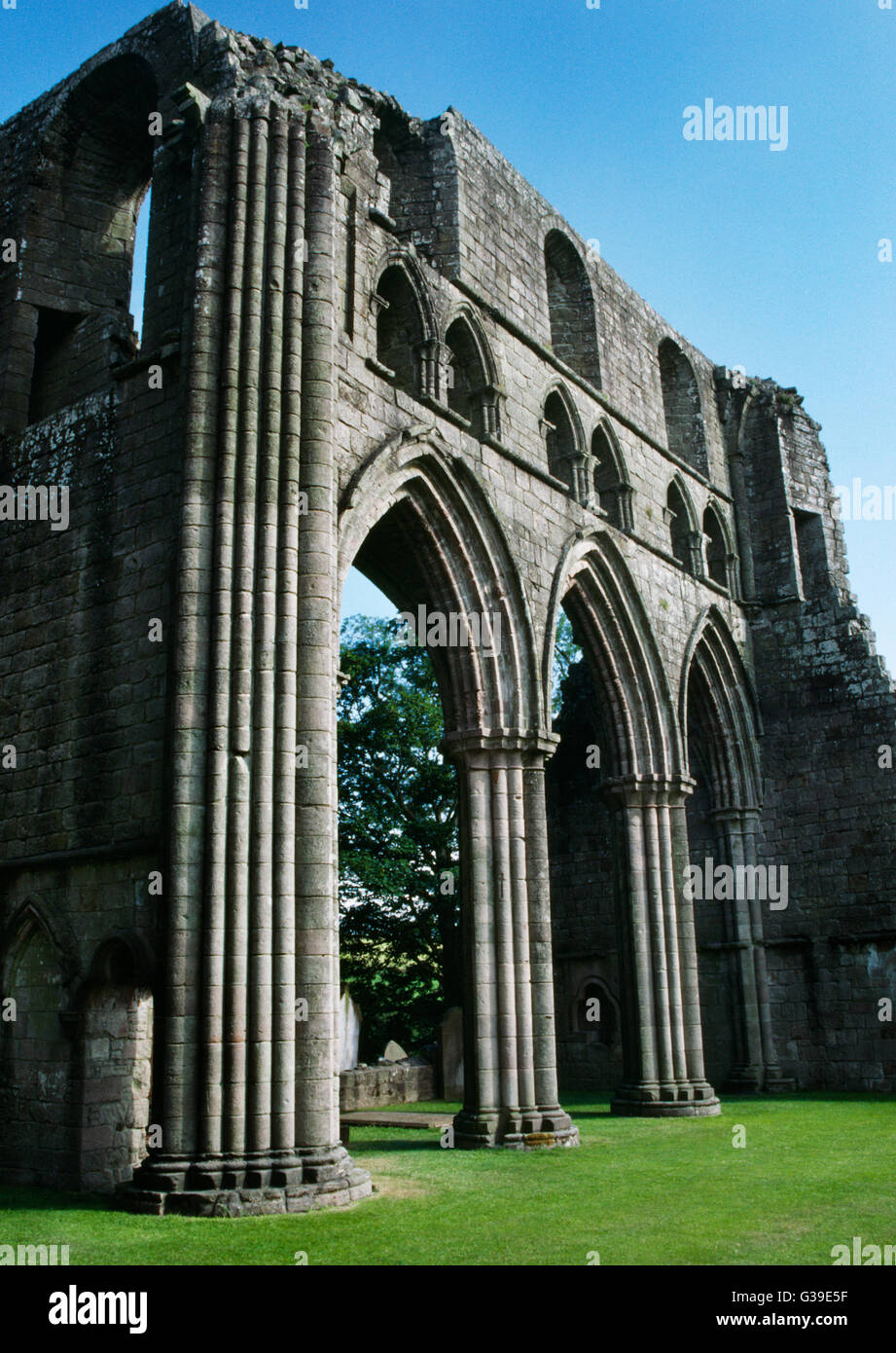 South transept of Dundrennan Abbey church, Kirkcudbright, with arches to the 3 chapels & SE pier of chancel arch (front L). Stock Photo