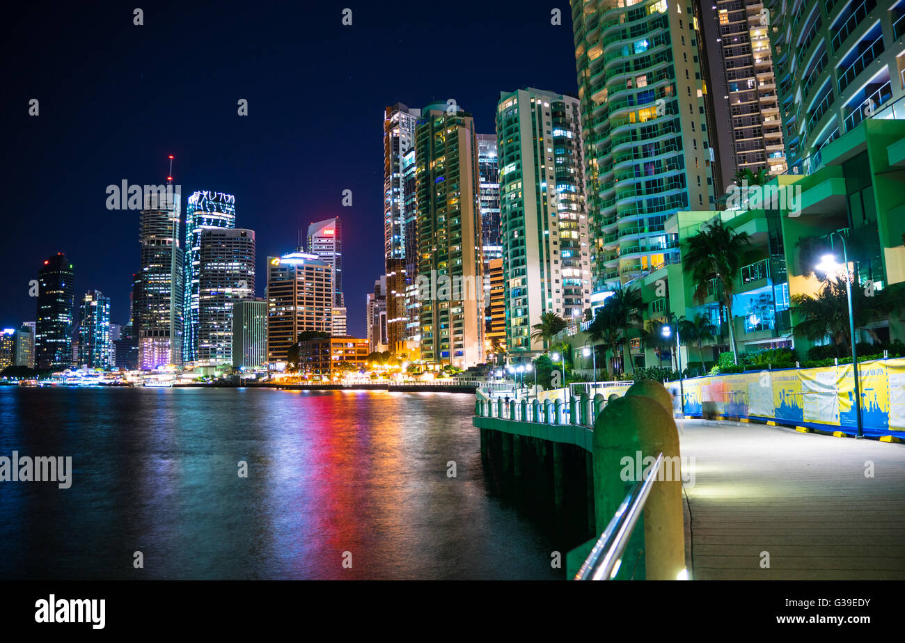 Walking down the boardwalk in Brisbane Australia looking across to the city. Beautiful colour water reflections. Stock Photo