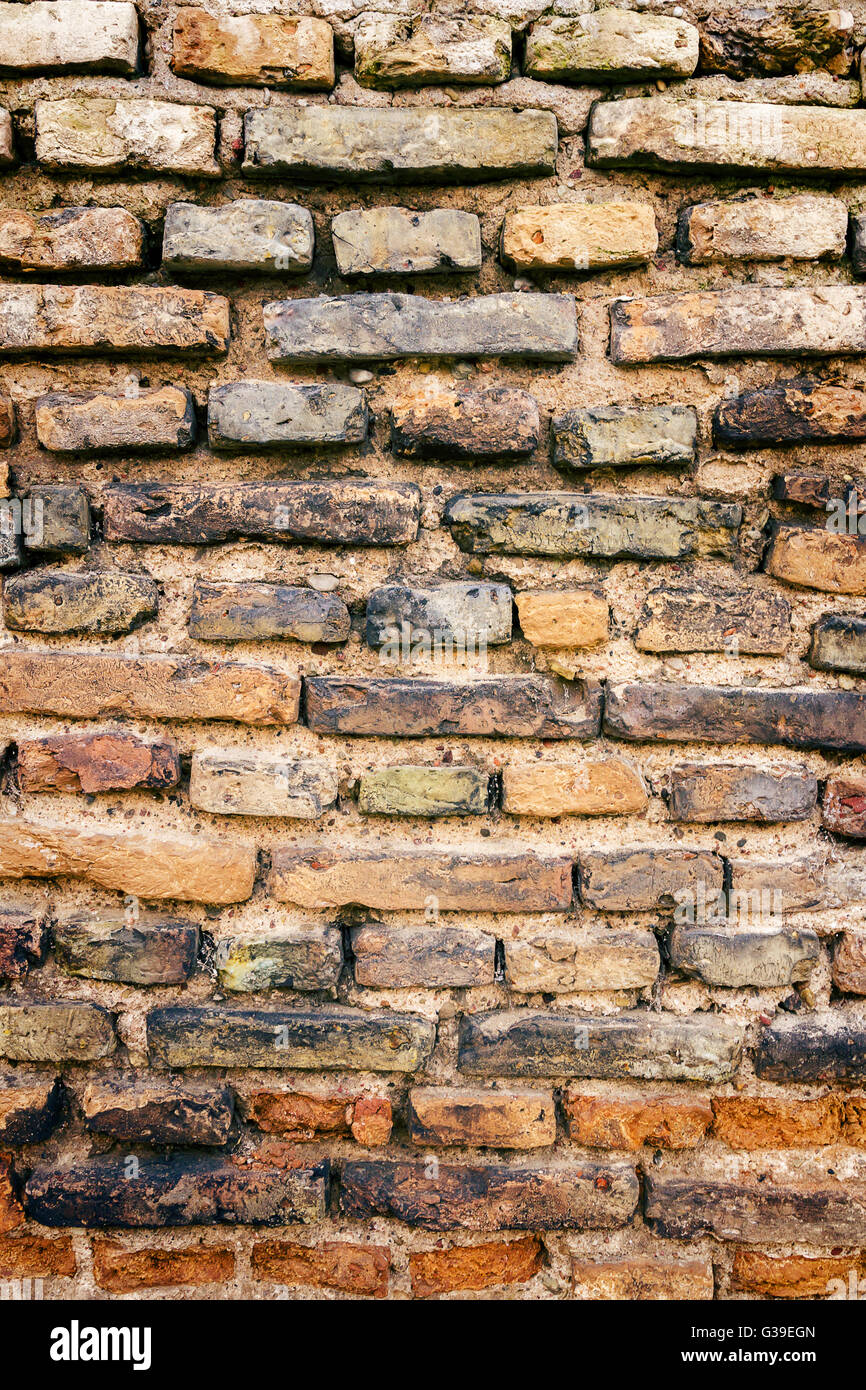 Background of old yellow brick wall texture Stock Photo Alamy