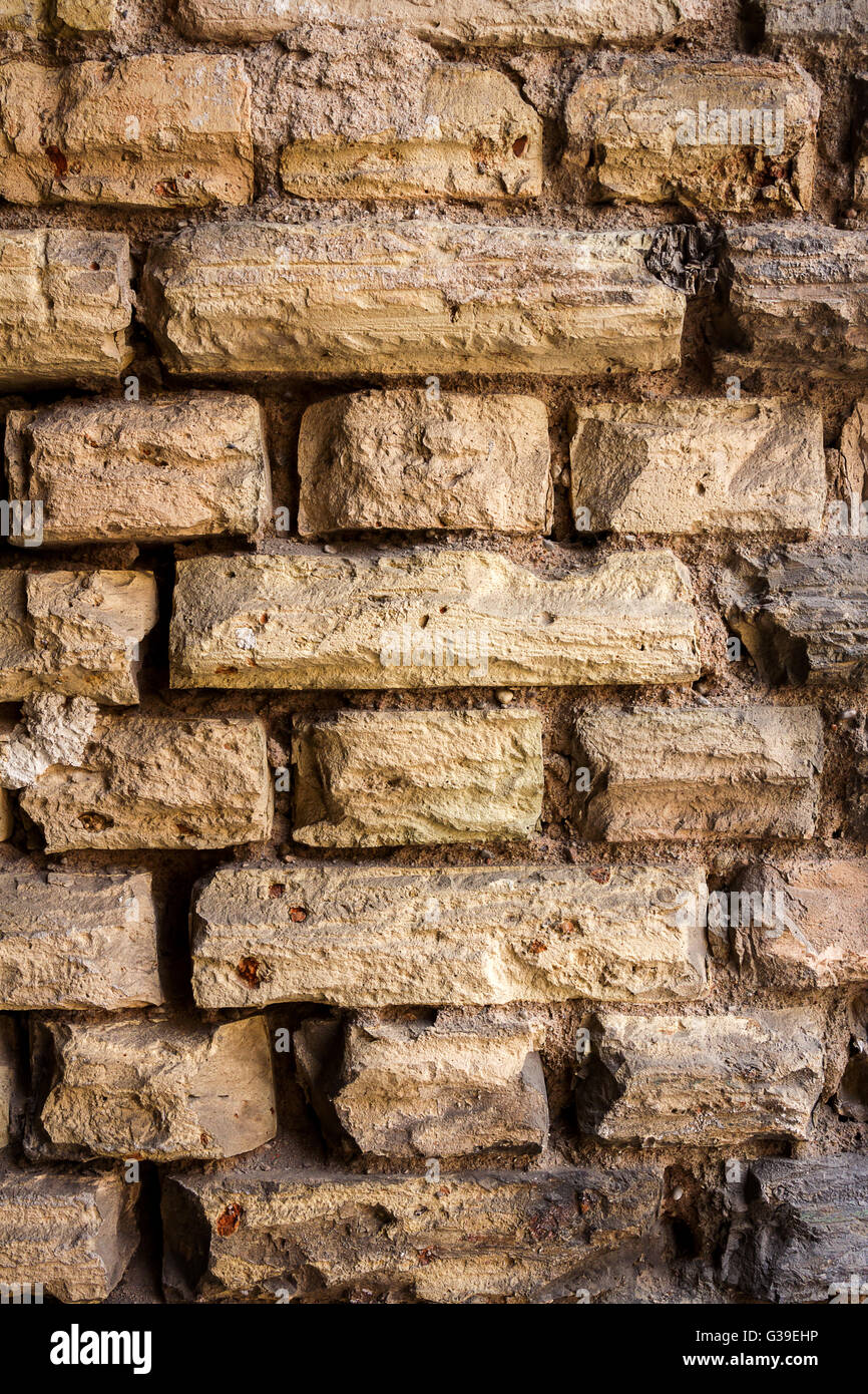 Background of old yellow brick wall texture Stock Photo - Alamy