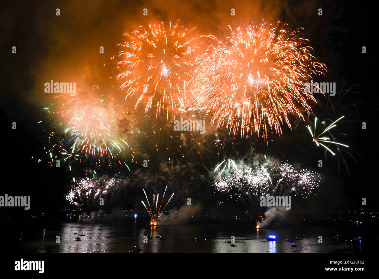 Brightly colorful fireworks in the night sky Stock Photo - Alamy