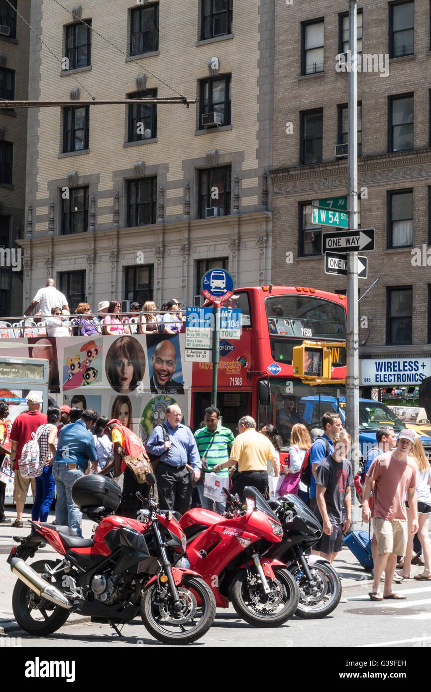 Double Decker Tour Bus at Intersection, NYC Stock Photo