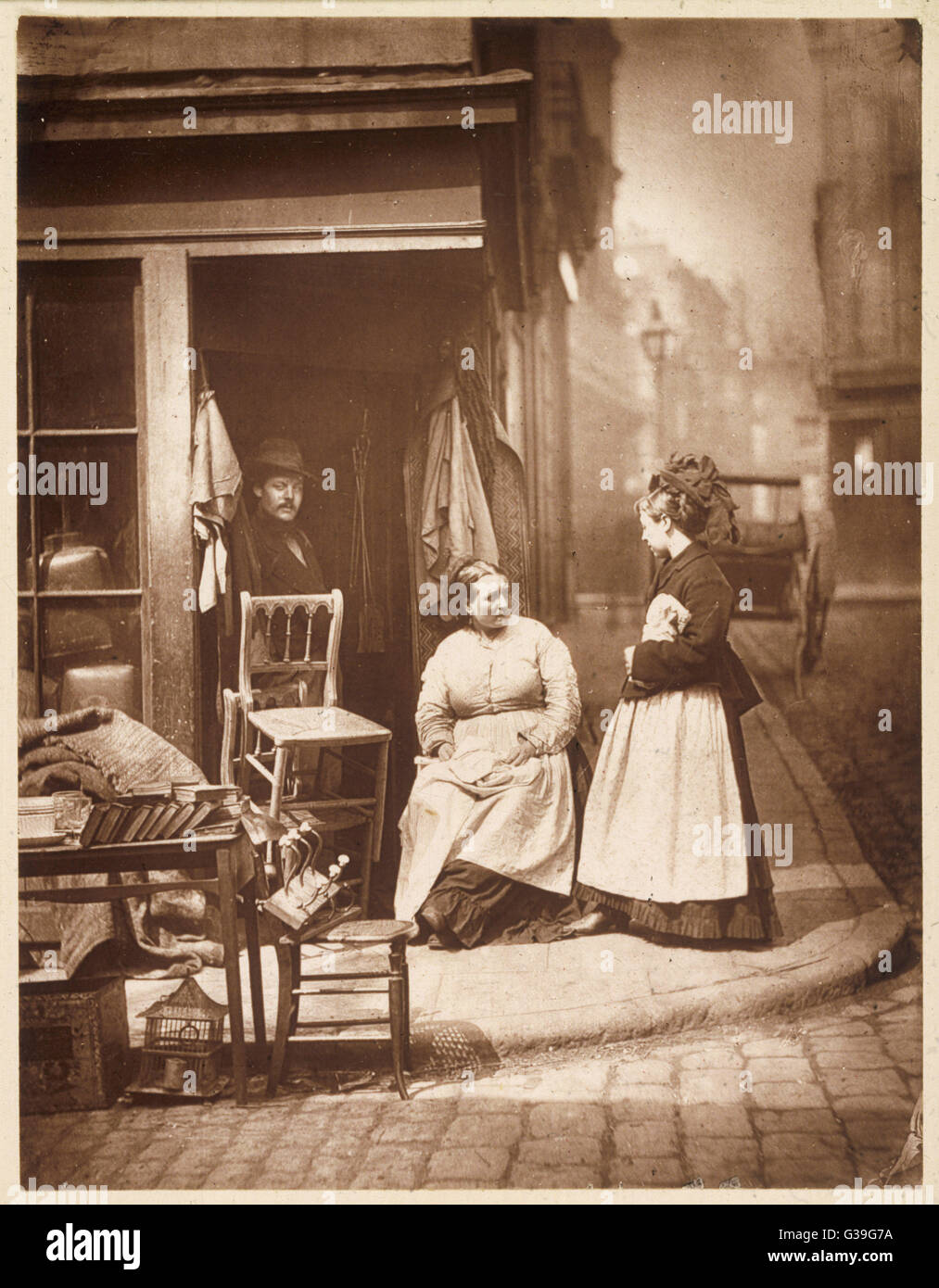 Junk shop at Seven Dials  (Covent Garden) London.        Date: 1877 Stock Photo