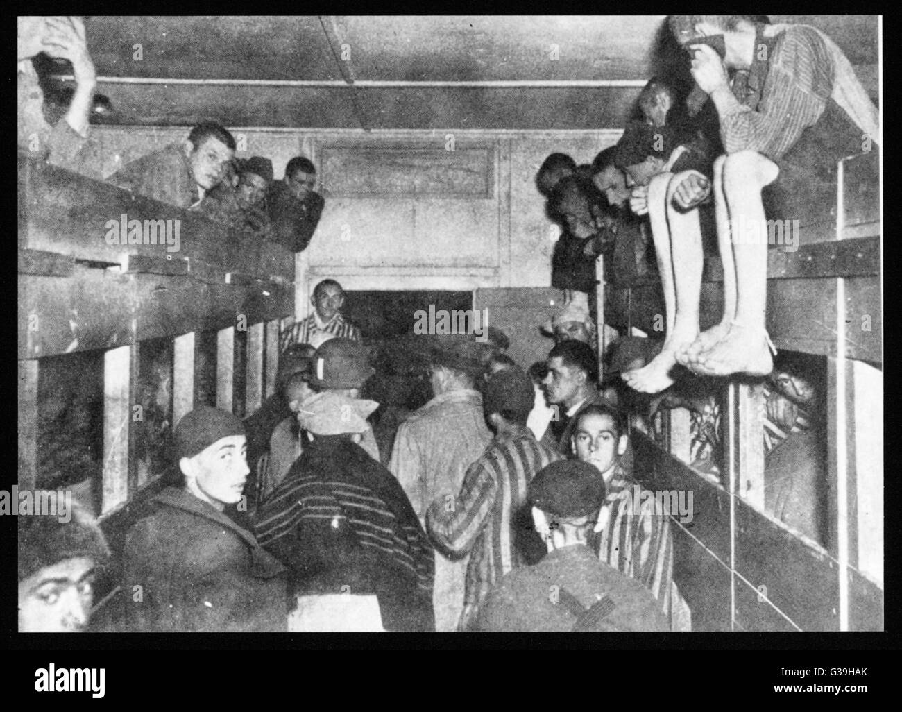 Inmates at an unidentified  concentration camp in their  accommodation block. Stock Photo