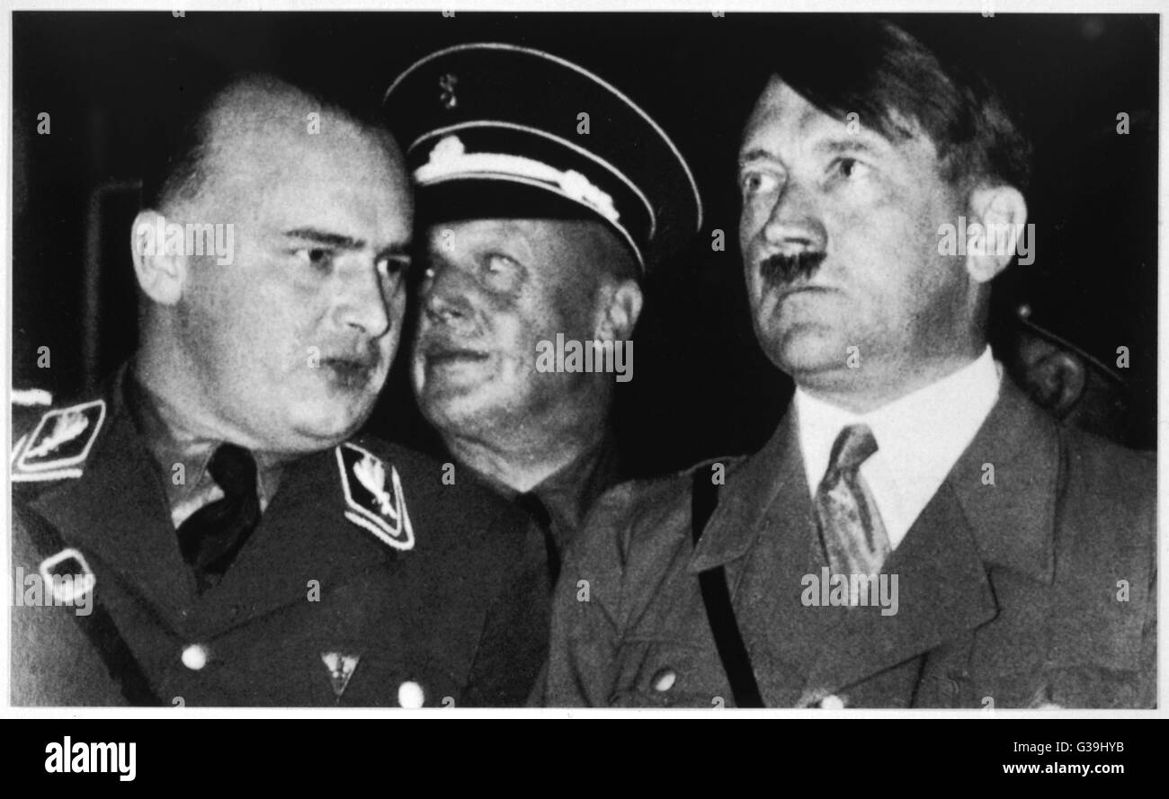 HANS FRANK With Hitler and Hans Heinrich  Lammers (centre, behind) in 1933       Date: 1900 - 1946 Stock Photo