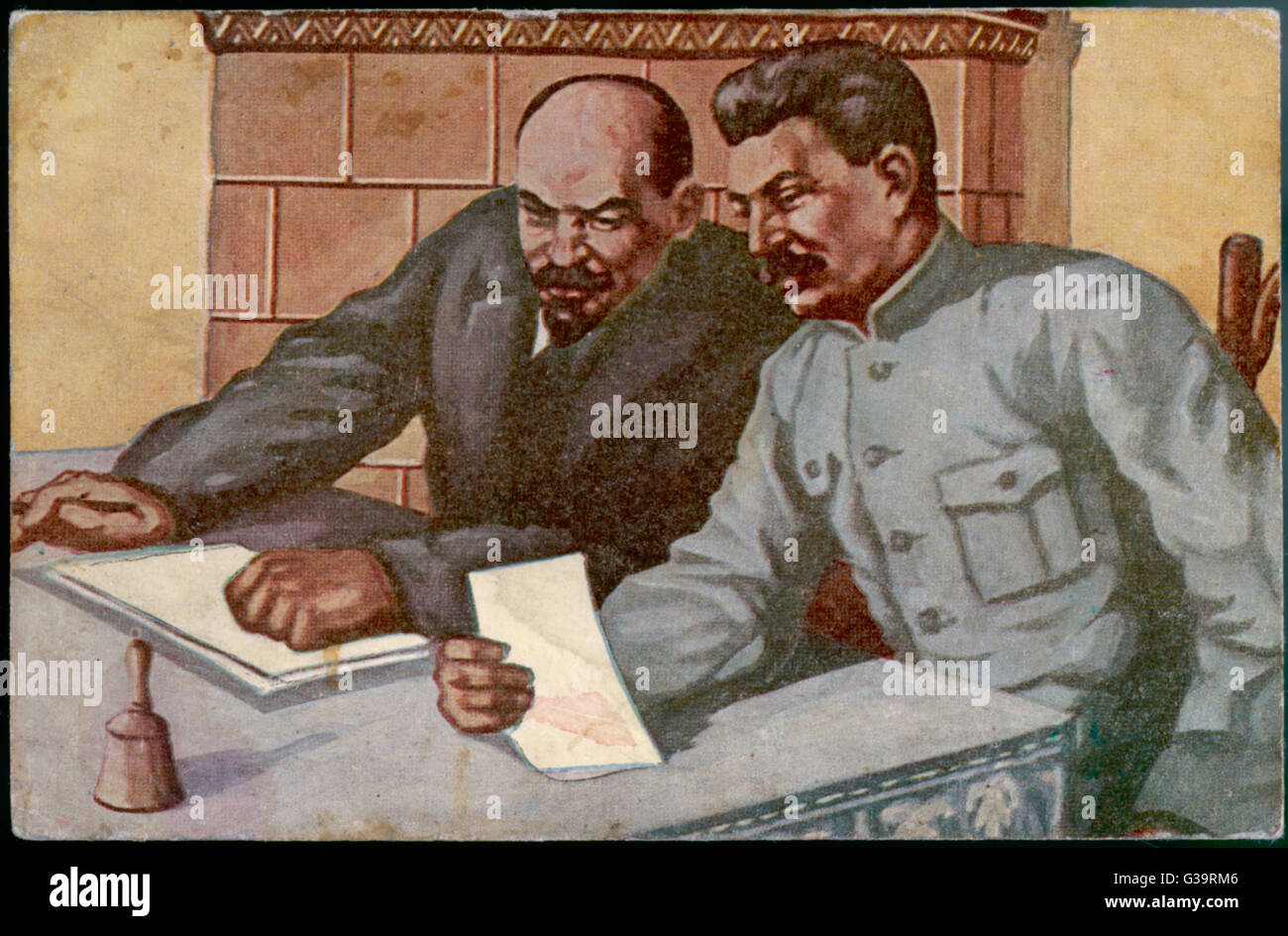 LENIN and STALIN discuss their plans         Date: circa 1920 Stock Photo