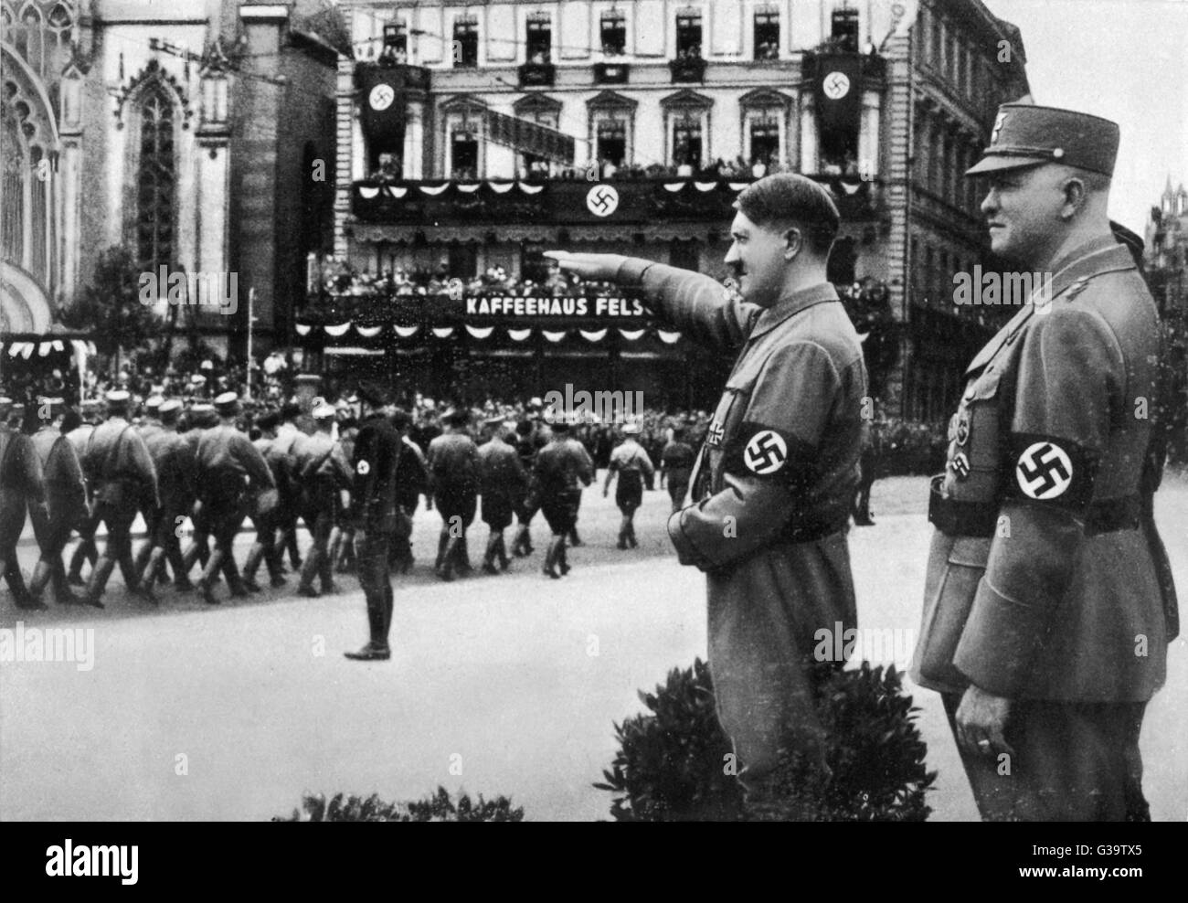 ADOLF HITLER  Saluting the march-past at Leipzig in 1933       Date: 1889 - 1945 Stock Photo