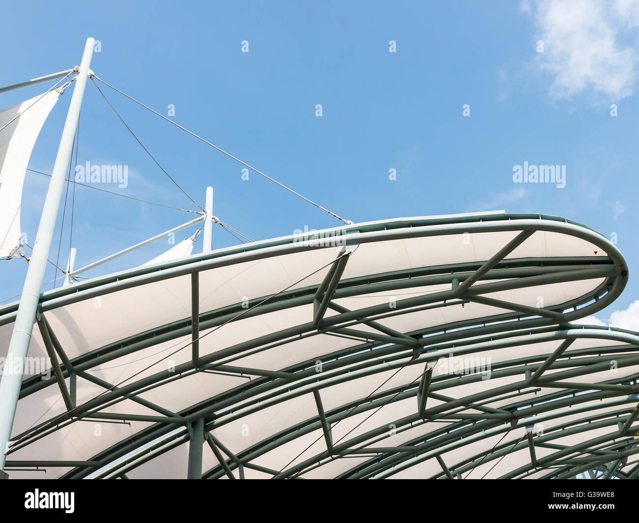 Metal frame of the canvas canopy above the walk way Stock Photo - Alamy