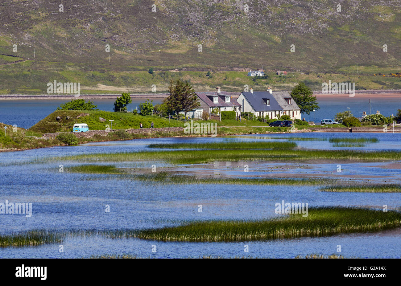 Cottages at Milltown viewed over Loch a' Mhuilinn. Near Applecross