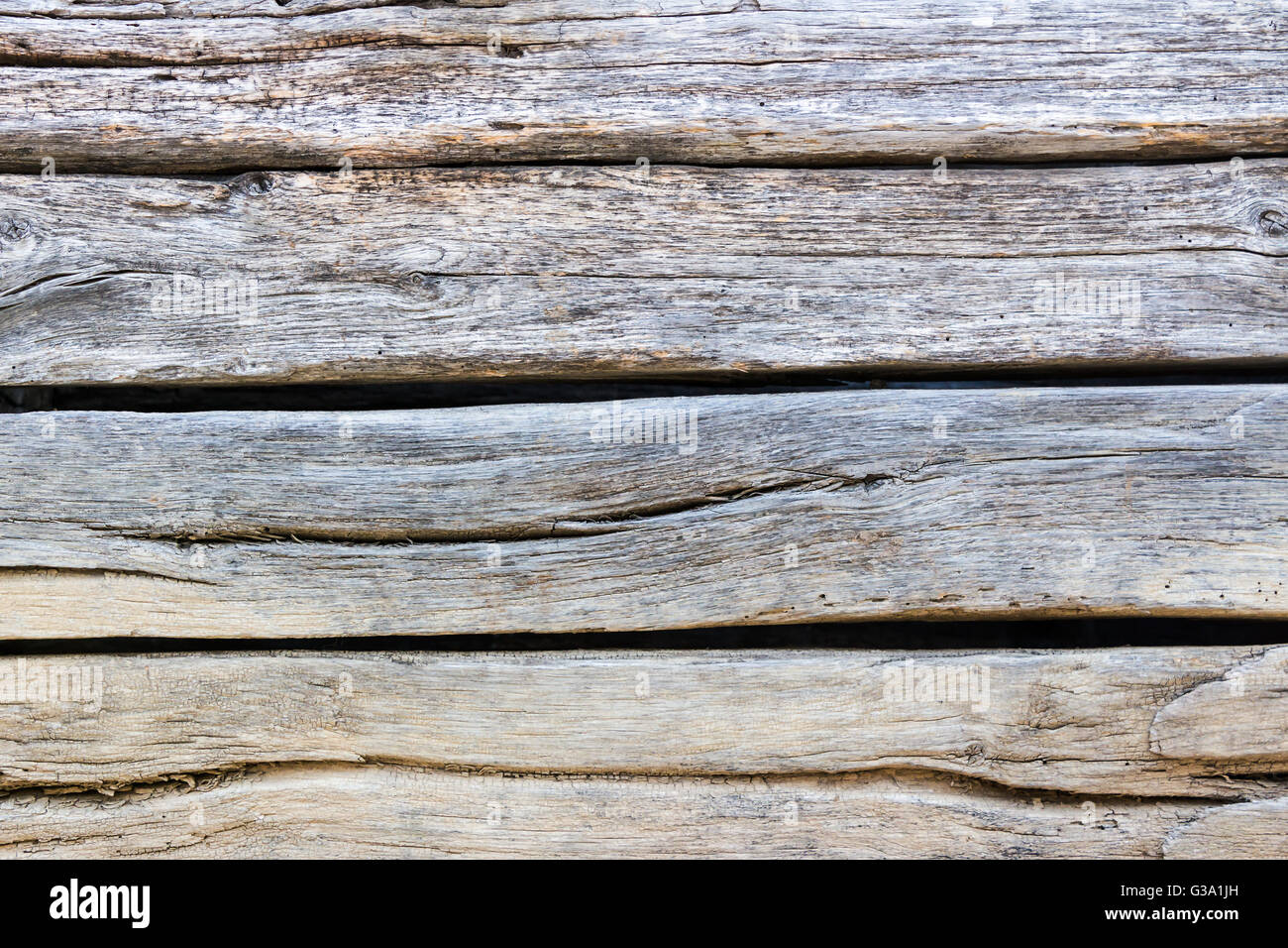 embossed texture of very old and wrinkled wooden planks Stock Photo