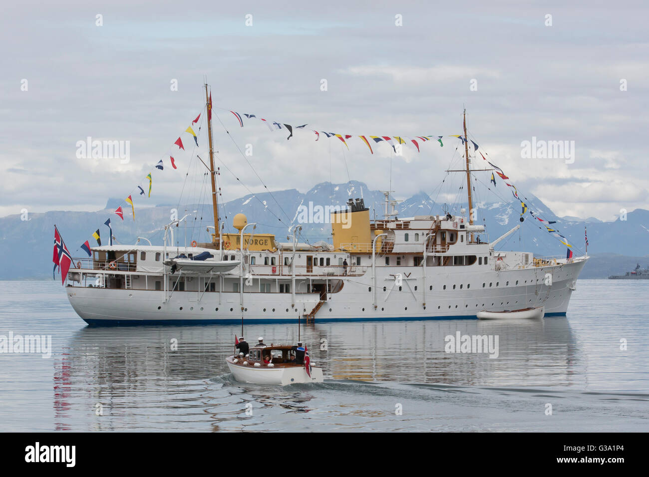 King Harald of Norway and Queen Sonja of Norway return to the Norwegian Royal Yacht, KS Norge, after visiting Harstad, in Norway Stock Photo