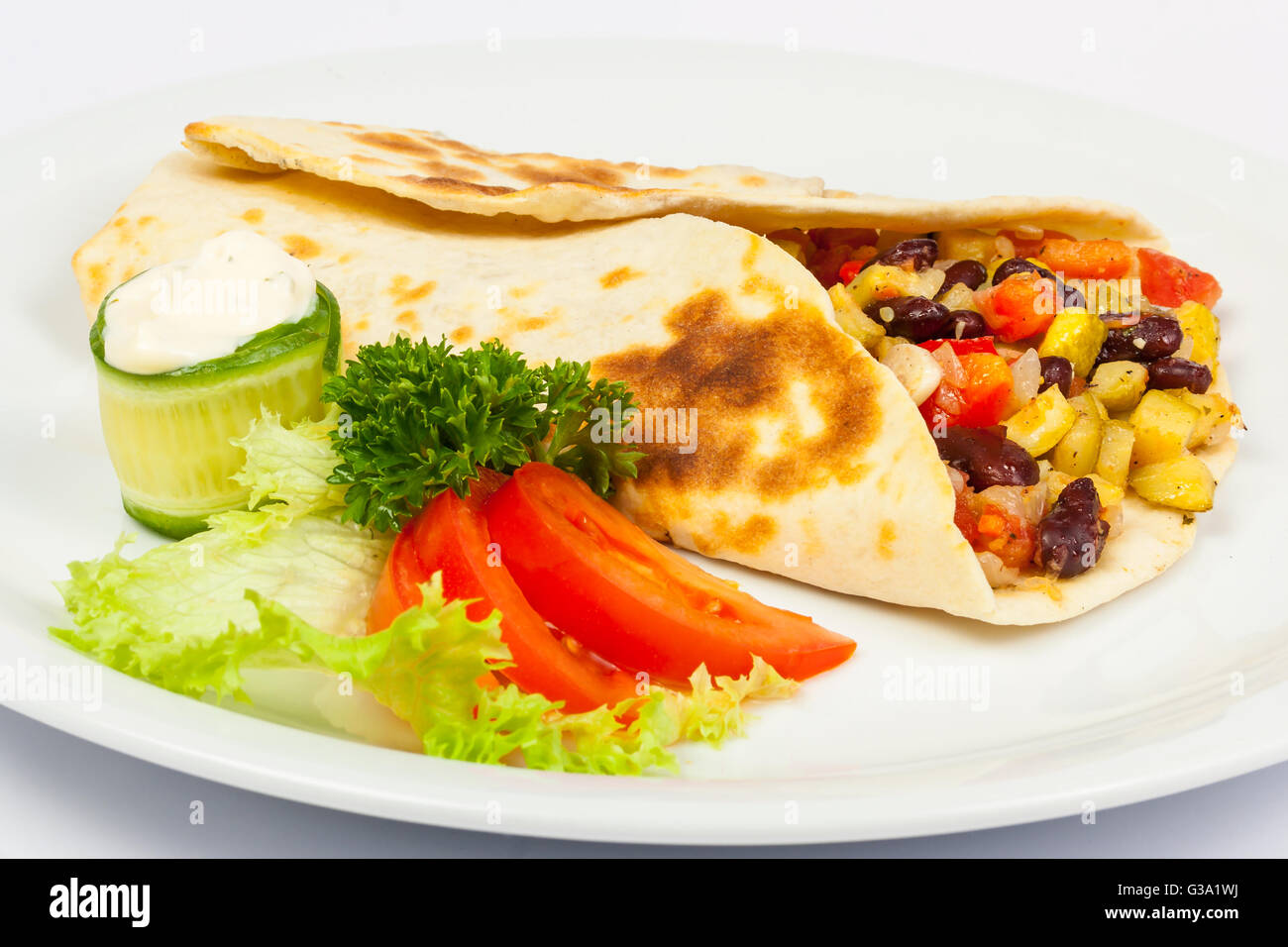 eastern spicy burrito with beans and squash Stock Photo