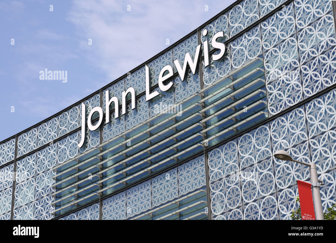 Exterior view of the John Lewis store at the Westfield Stratford shopping mall in London, UK. Close-up of logo on glazed facade Stock Photo