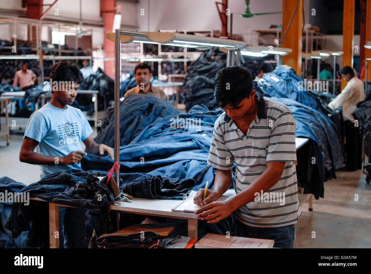 BANGLADESH , Dhaka, apparel industry, Beximco textile factory produce Jeans  for export for western discounter, department for stone wash and grinding  Stock Photo - Alamy