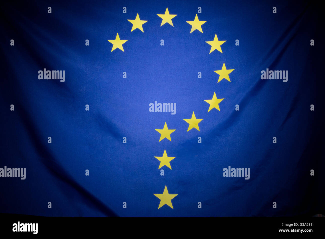 A large EU flag edited into the shape of a question mark, symbolizing a decision or choice concerning Europe. Stock Photo