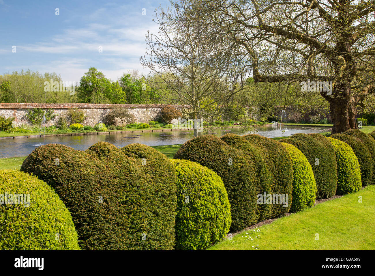 Landscaped gardens at St Cross Hospital and Almshouse of Noble Poverty in Winchester, England Stock Photo