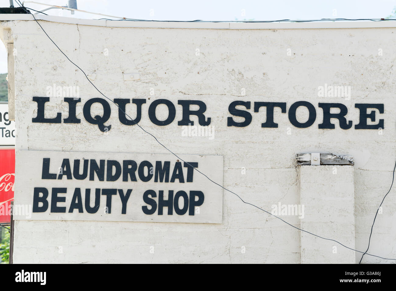 Combination liquor store, laundromat and beauty shop in the small town