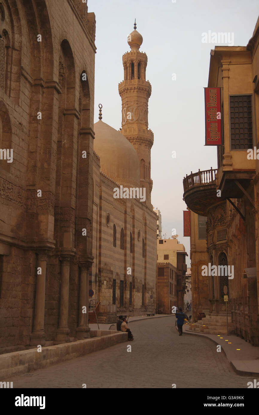 Barquq complex with dome and minaret, left a part of Qalawun complex, Al-Muizz li-Din Allah street, Cairo Stock Photo