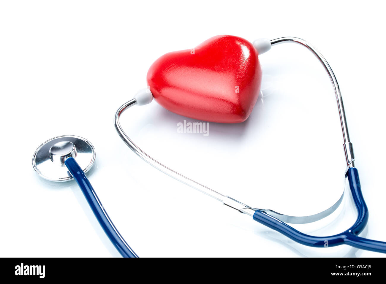 Red heart with stethoscope isolated on white background, healthcare Stock Photo