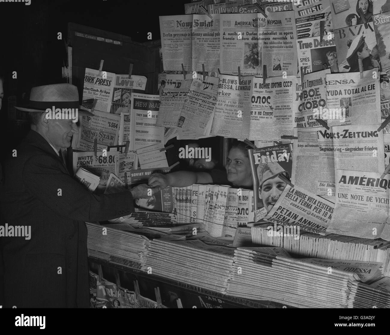 Newsstand with foreign language newspapers Stock Photo