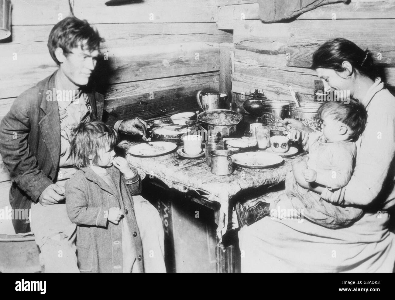 Red Cross picture of destitute family Stock Photo
