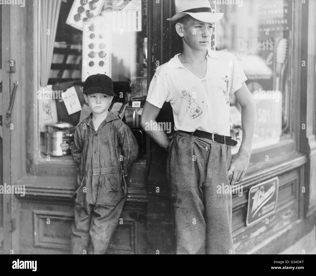 Boys in front of drugstore. Dover, Delaware. Date 1938 July. Stock Photo