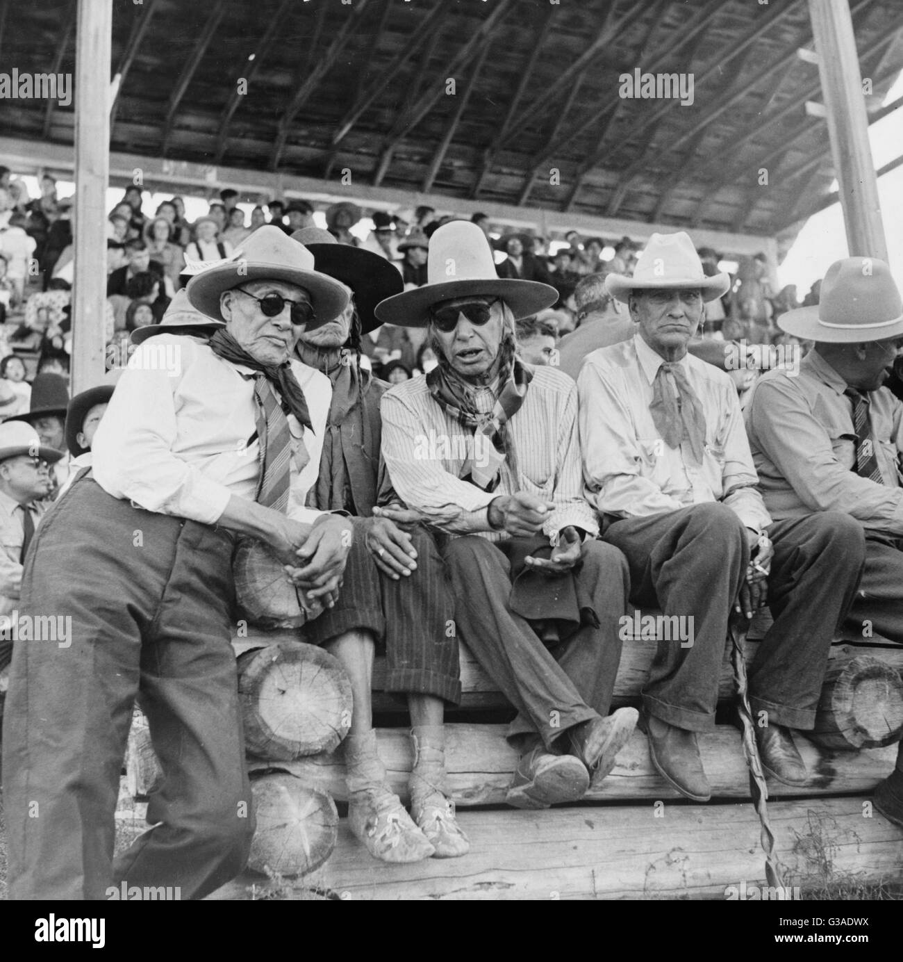 Indians watching Crow fair at Crow Agency, Montana. Date 1941 Aug Stock