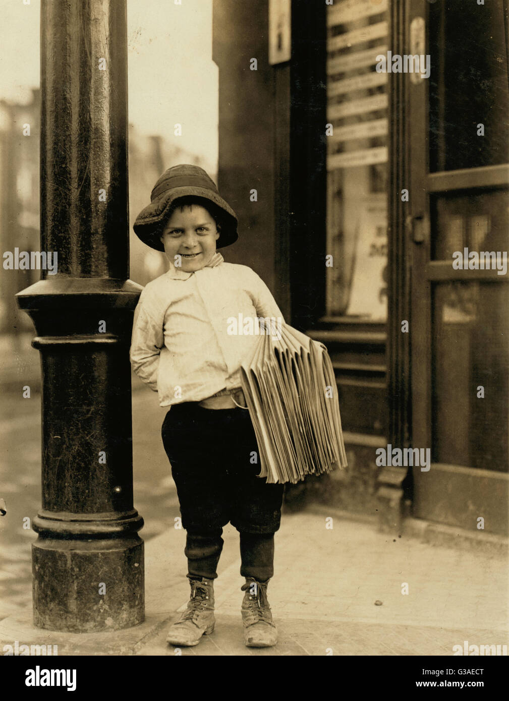 Newsboy. Little Fattie. Less than 40 inches high, 6 years ol Stock Photo